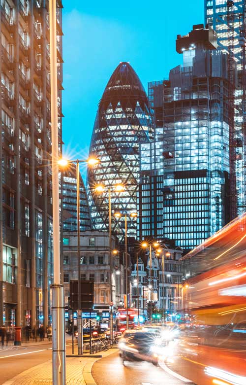 The Gherkin building in London, UK A busy road in London, Fenchurch Street.